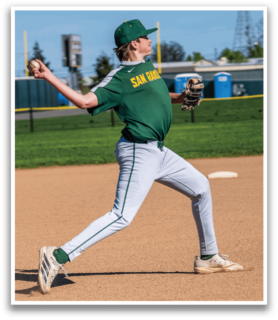 A baseball player in a green and white uniform is throwing a ball. AI generated content