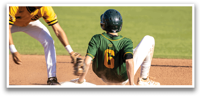 A baseball player slides into a base. Description generated by AI