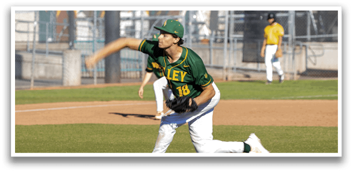 A baseball player in a green and yellow uniform is pitching a ball. Description generated by AI