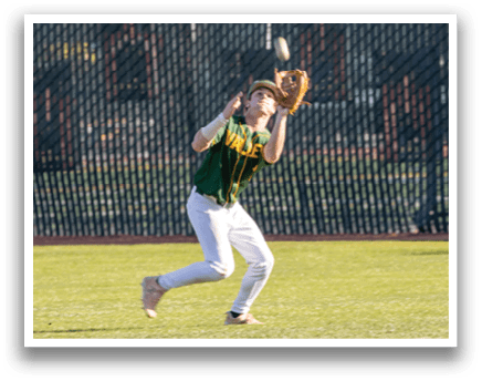A baseball player catching a ball. Description generated by AI