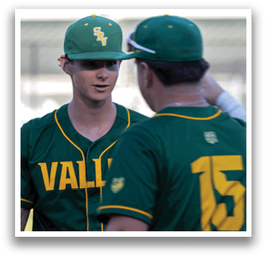 Two baseball players wearing green and yellow uniforms. Description generated by AI