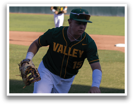 A baseball player wearing a green and yellow jersey. Description generated by AI