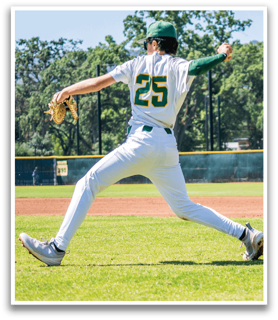 A group of baseball players standing on a field. Description generated by AI