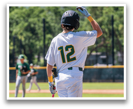 A baseball player with the number 12 on his shirt. Description generated by AI