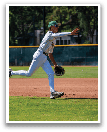 A baseball player in a white uniform is throwing a ball. Description generated by AI