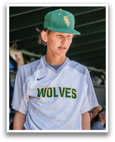 A baseball player wearing a green and white hat. Description generated by AI