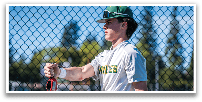 A man wearing a baseball cap and a white shirt is holding a baseball bat. AI generated content