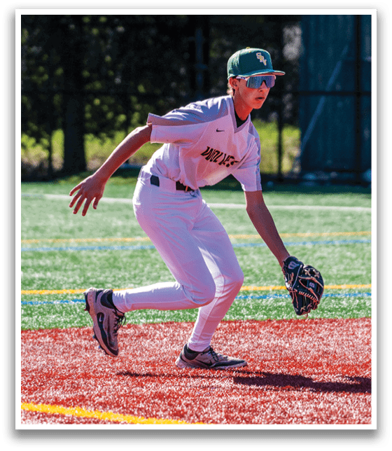 A baseball player in a grey uniform is running on the field. AI generated content