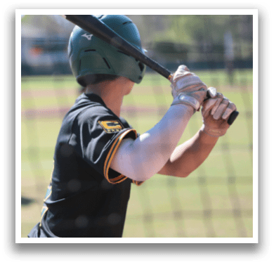 A baseball player is holding a bat, preparing to swing at a pitch. AI generated content