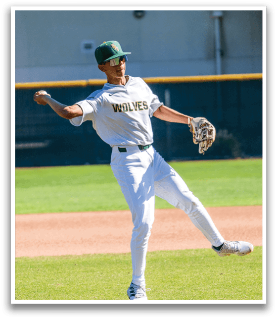 A baseball player in a white uniform is throwing a ball on a field. AI generated content