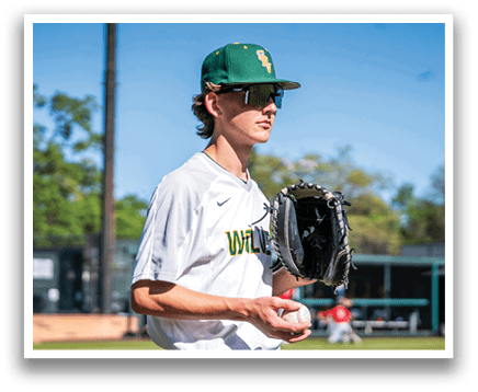 A baseball player wearing a green and white hat and holding a baseball glove. AI generated content