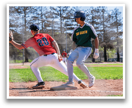 Two baseball players are running on the field. One player is wearing a red shirt and the other is wearing a green shirt. AI generated content