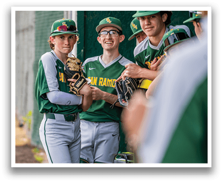 A group of young men wearing baseball uniforms are standing next to a fence. AI generated content