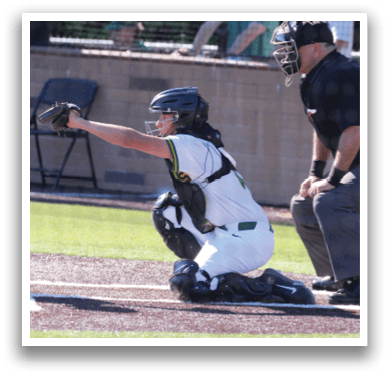 A baseball player is holding a bat, preparing to swing at a pitch. The catcher and umpire are positioned behind him, ready for the play. AI generated content