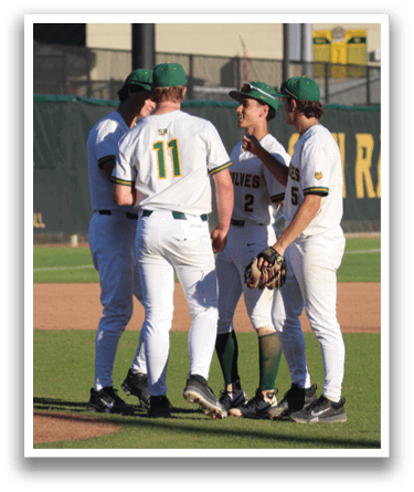 Baseball players wearing white uniforms and green hats standing on a field. AI generated content
