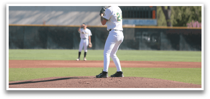 A baseball player in a white uniform is standing on the pitcher's mound, getting ready to throw the ball. AI generated content