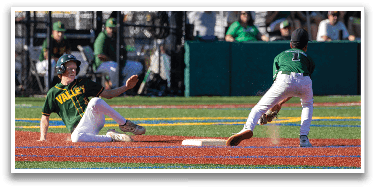 Two baseball players are on the field, one sliding into home plate while the other is trying to catch the ball. AI generated content