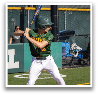 A baseball player in a green and yellow uniform is swinging a bat at a ball. AI generated content