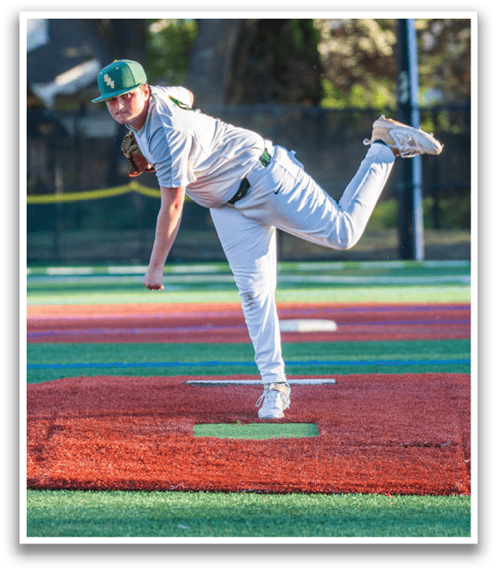A baseball player in a white uniform is pitching a ball on a field. AI generated content