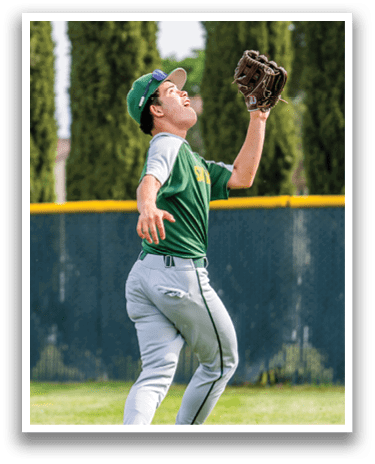 A boy catching a baseball in a field. AI generated content