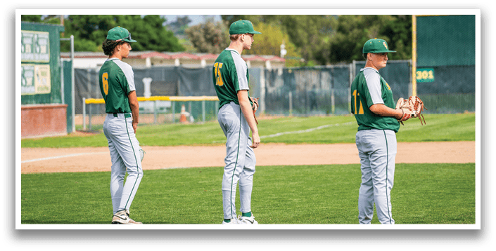 Three baseball players wearing green and yellow uniforms are standing on a field. AI generated content