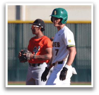 Two baseball players are standing on a field, one wearing a green helmet and the other wearing a red helmet. They are both holding baseball gloves, ready to play. AI generated content