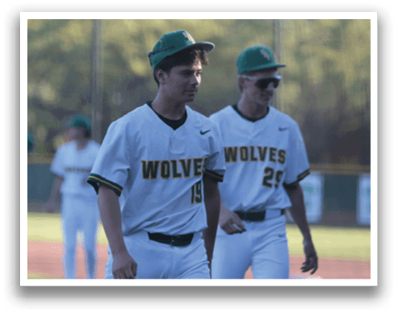 A group of baseball players wearing green hats and white uniforms are walking on a field. AI generated content
