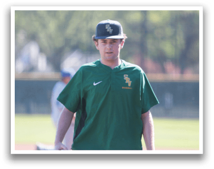 A man wearing a green and yellow shirt is standing on a baseball field. AI generated content
