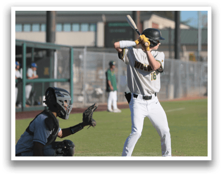 A baseball player is at bat, holding a bat and preparing to swing. AI generated content