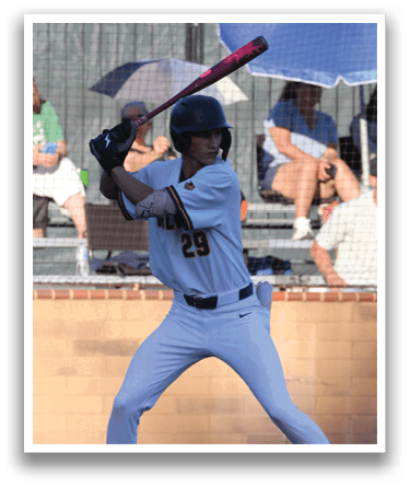 A baseball player in a white uniform is holding a bat, preparing to swing. AI generated content