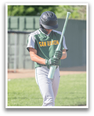 A baseball player in a green and white uniform holding a bat. AI generated content