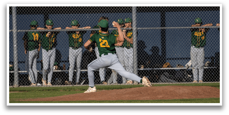A baseball player in a green and yellow uniform is pitching a ball. AI generated content