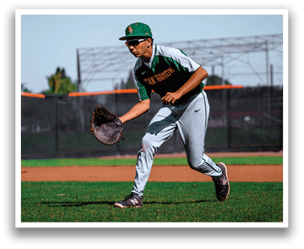 A baseball player in a green and white uniform is attempting to catch a ball. AI generated content