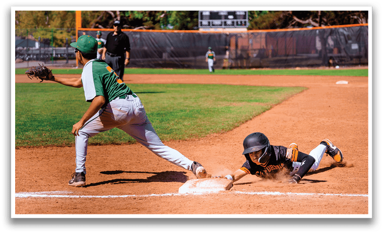 A boy slides into a base during a baseball game. AI generated content