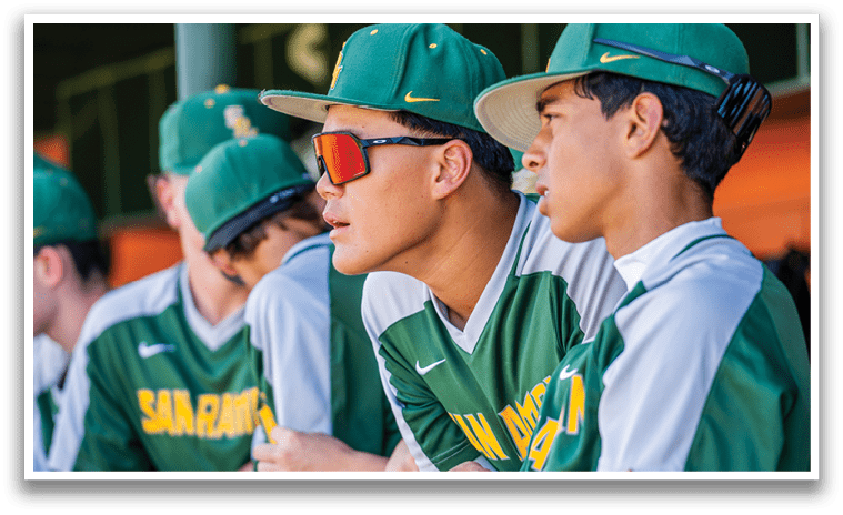 Baseball players wearing green and white uniforms sitting on a bench. AI generated content