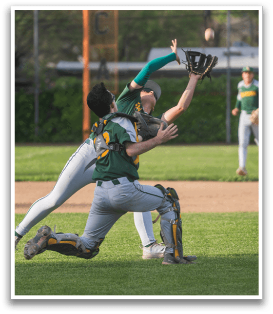 Two baseball players are competing for a ball, with one player reaching for it and the other trying to catch it. The players are wearing baseball gloves. AI generated content