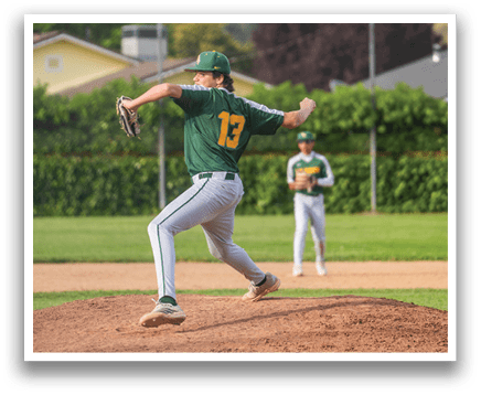 A baseball player in a green and yellow uniform is pitching a ball on a field. AI generated content