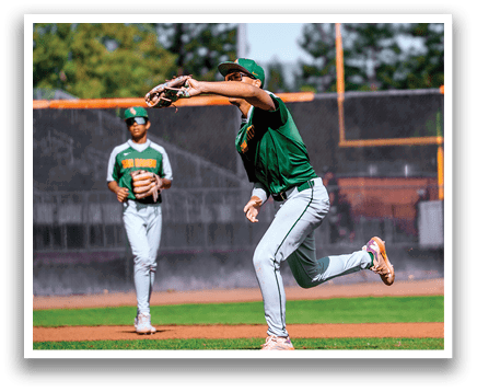 Two baseball players on a field, one catching a ball and the other running. AI generated content