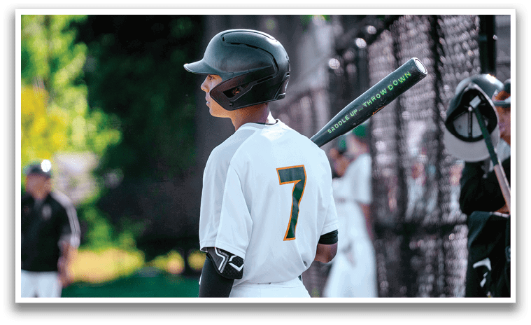 A baseball player wearing a helmet and holding a bat. Description generated by AI