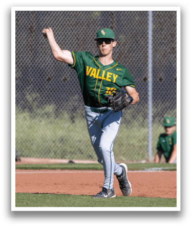 A baseball player in a green and yellow shirt is pitching a ball. Description generated by AI