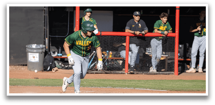 A baseball player running to first base. Description generated by AI