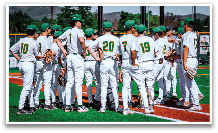 A group of baseball players wearing white uniforms and green hats. Description generated by AI