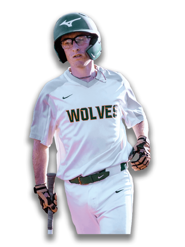 A baseball player wearing a helmet and a white jersey with the word wolves on it. Description generated by AI