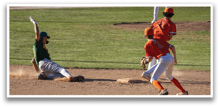 A baseball player slides into a base. Description generated by AI