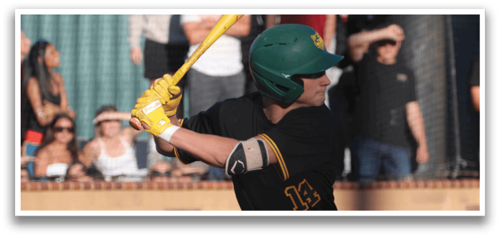 A baseball pitcher in a black shirt and white pants throwing a ball. Description generated by AI