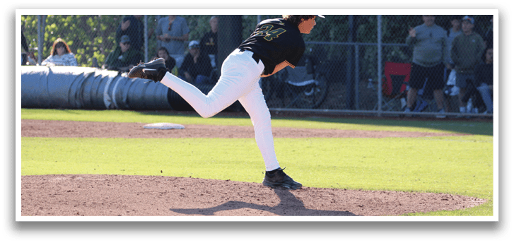 A baseball player in a black shirt and white pants is throwing a pitch. Description generated by AI