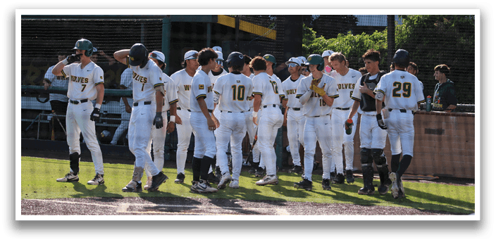 Baseball players standing on the field. Description generated by AI