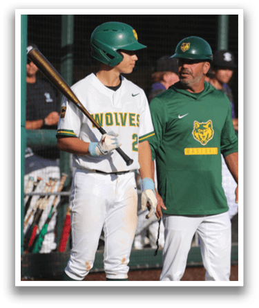 A baseball player holding a bat. Description generated by AI
