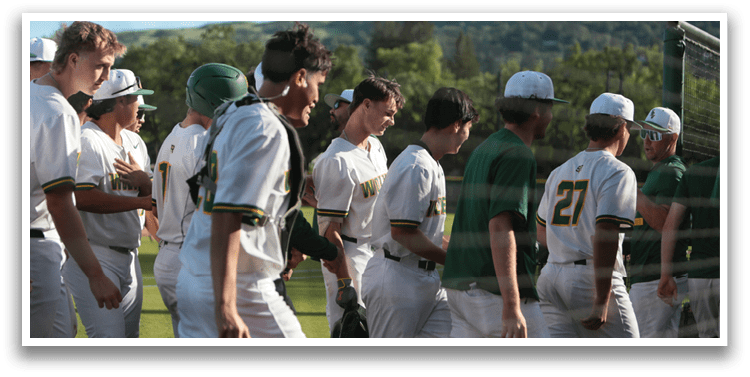 Baseball players walking on the field. Description generated by AI