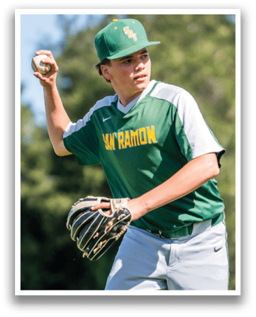 A baseball player wearing a green and white jersey and a baseball glove. Description generated by AI